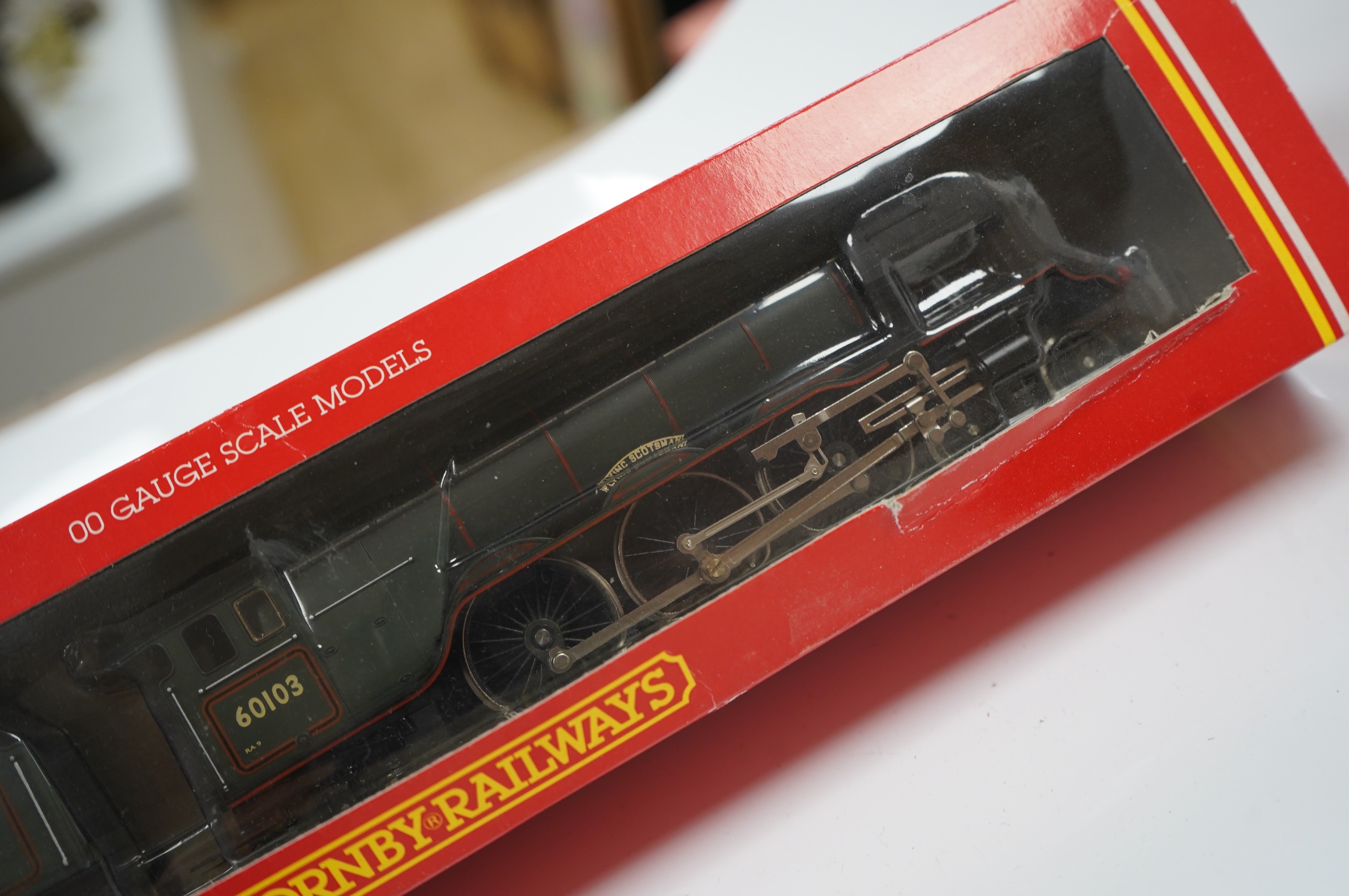 Three boxed Hornby and Bachmann 00 gauge railway BR locomotives; a Class 9F (32-850A), a Battle of Britain Class (R2692), and a Class A3 (R078). Condition - good.